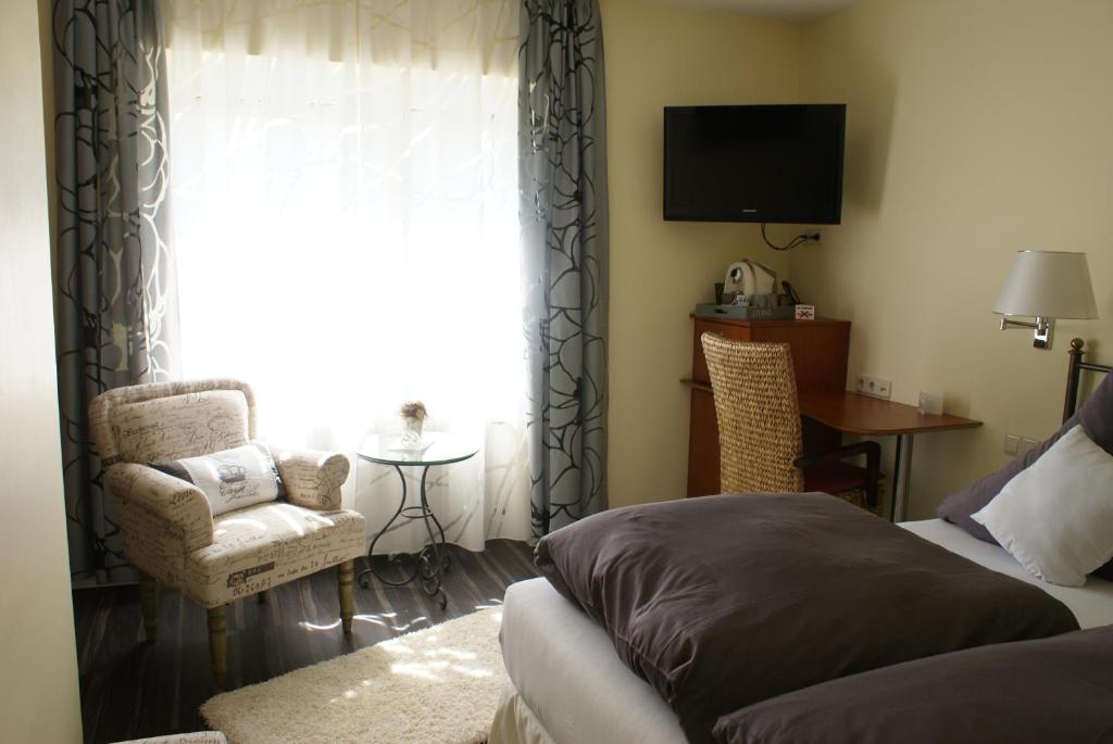 TV a/nebo společenská místnost v ubytování Hotel Storchen