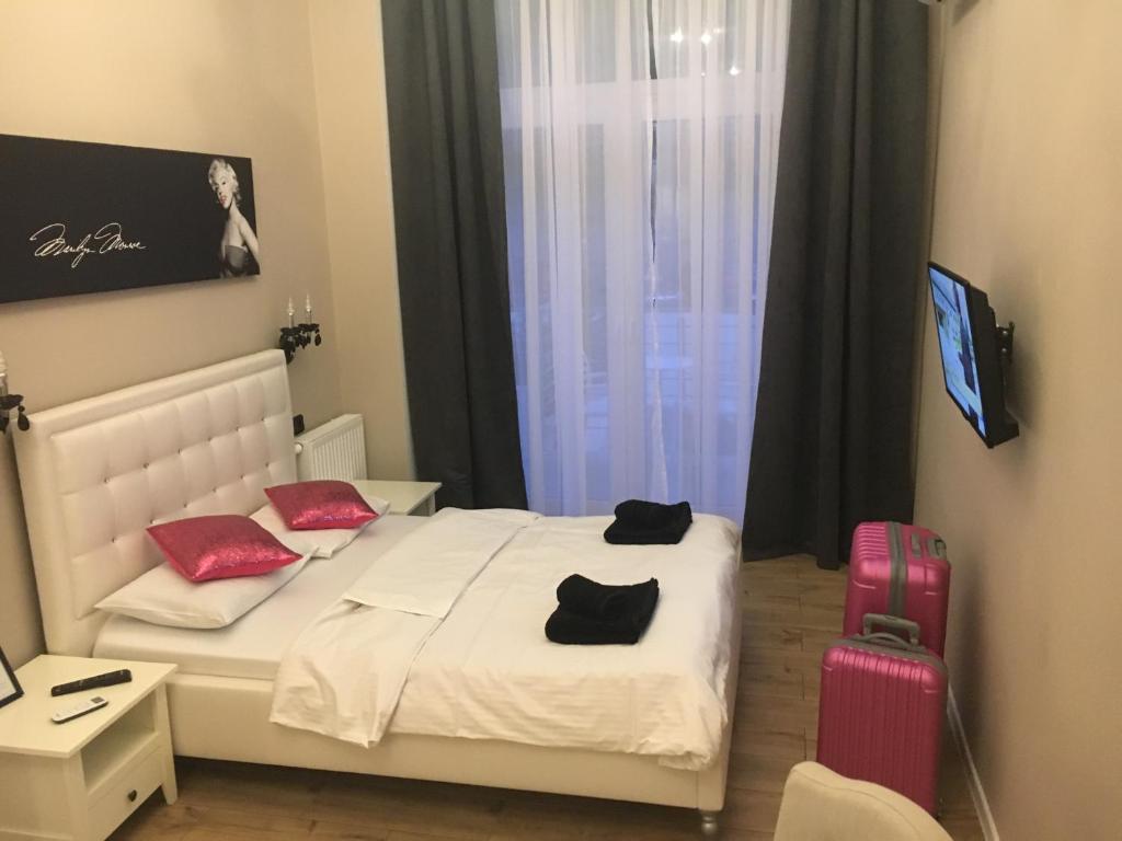 Posteľ alebo postele v izbe v ubytovaní Apart Promenada Gwiazd