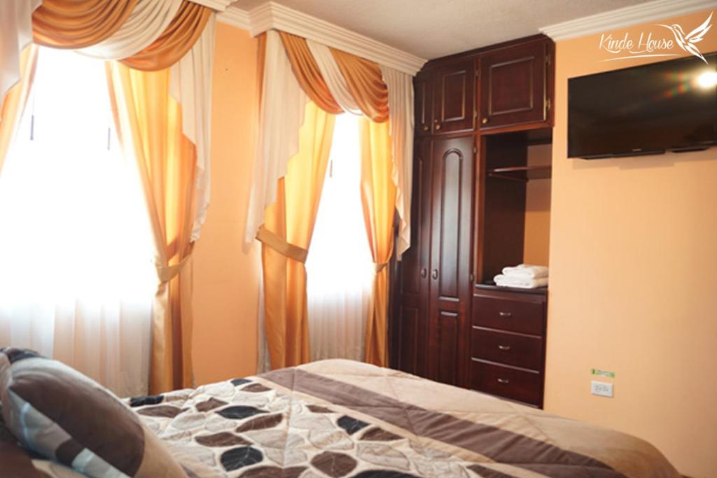 Postel nebo postele na pokoji v ubytování Kinde House