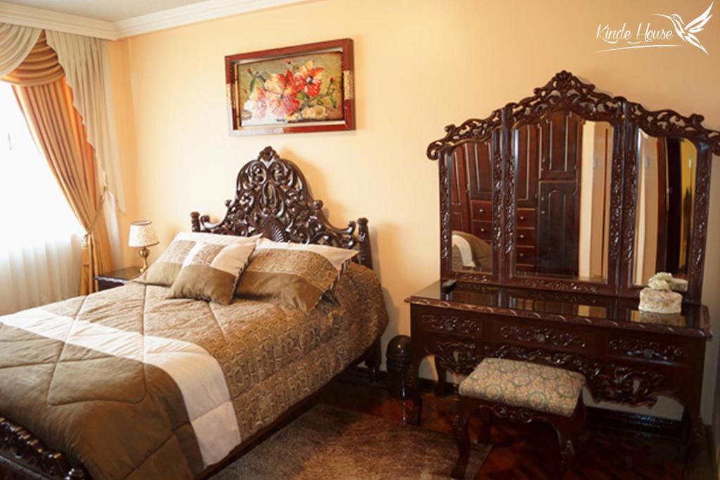Postel nebo postele na pokoji v ubytování Kinde House
