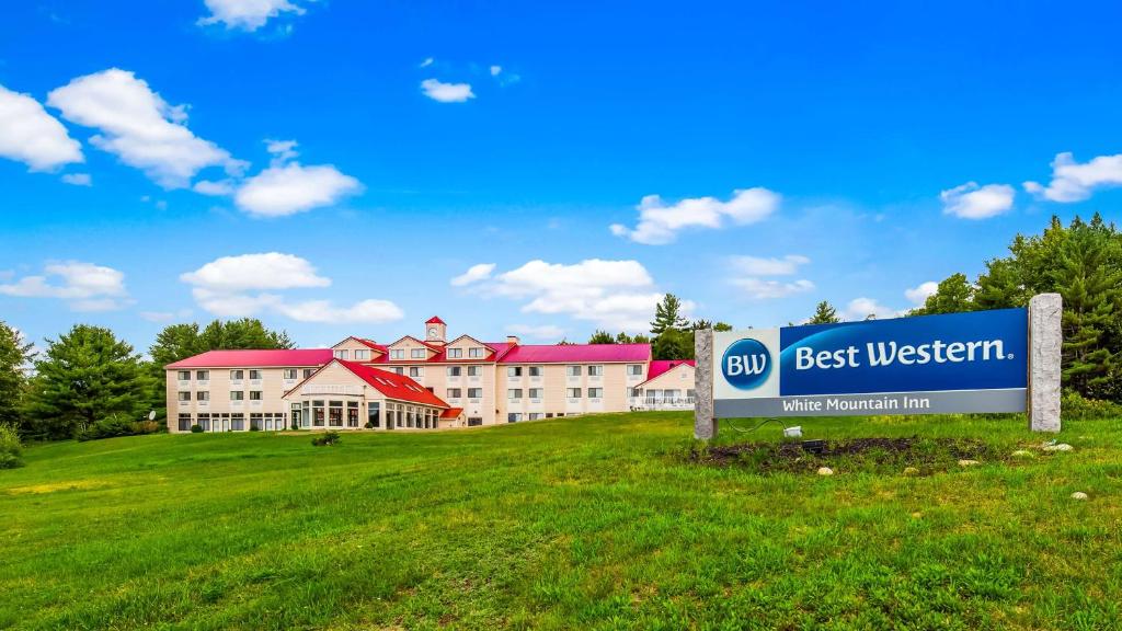 a large building with a sign in front of it at Best Western White Mountain Inn in Franconia