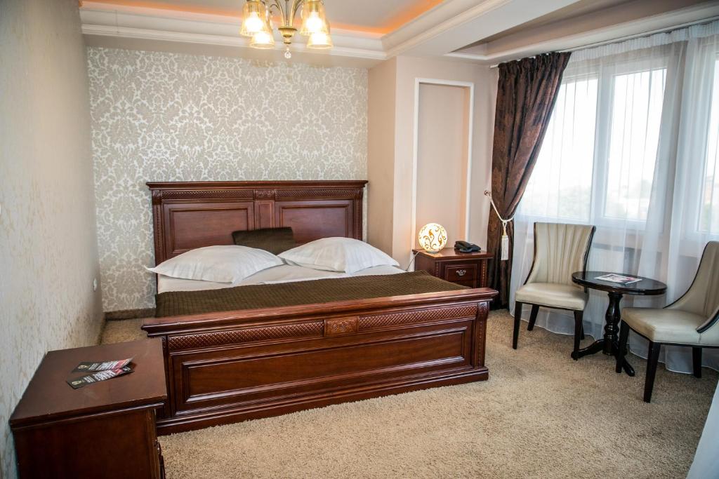 Postel nebo postele na pokoji v ubytování Hotel Megalos
