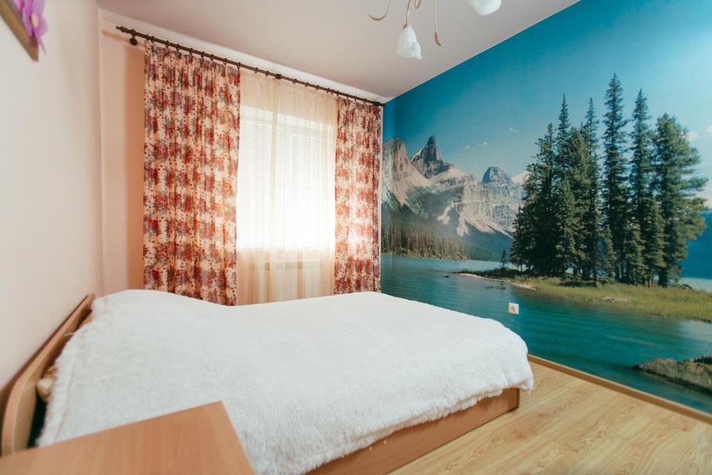 タンボフにあるApartment PrezentHaus Gorkogo 20のベッドルーム(ベッド1台付)