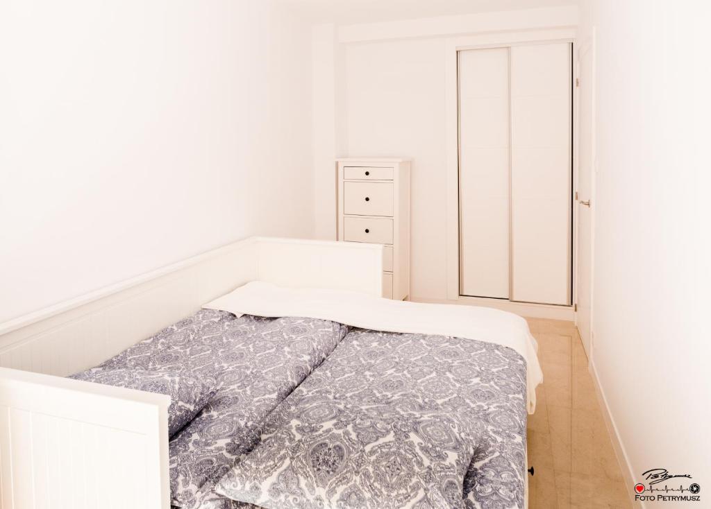 A bed or beds in a room at Casablanca