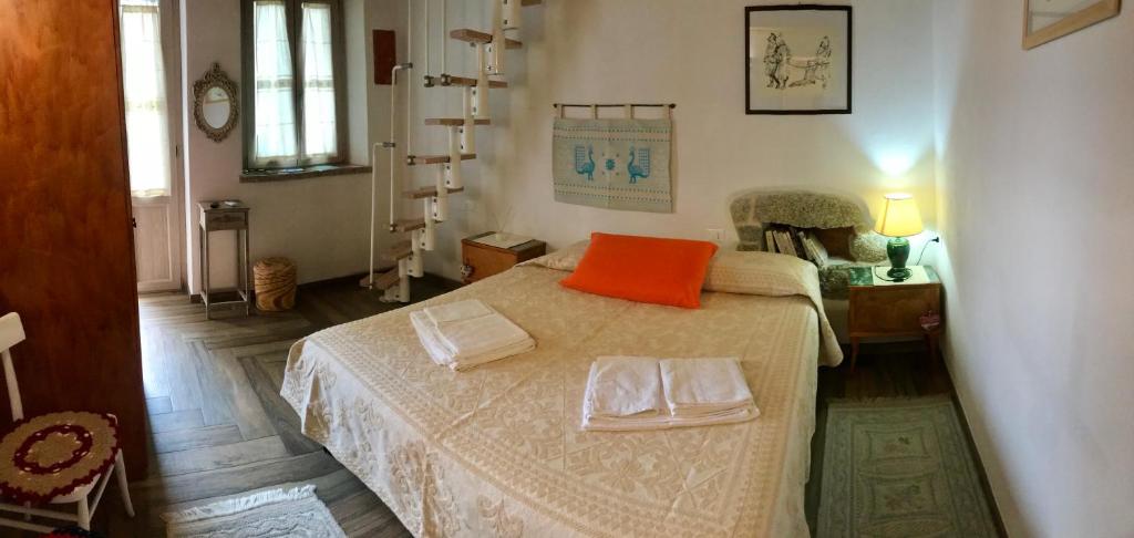Postel nebo postele na pokoji v ubytování B&B Pascal House Nuoro_IUN E5016