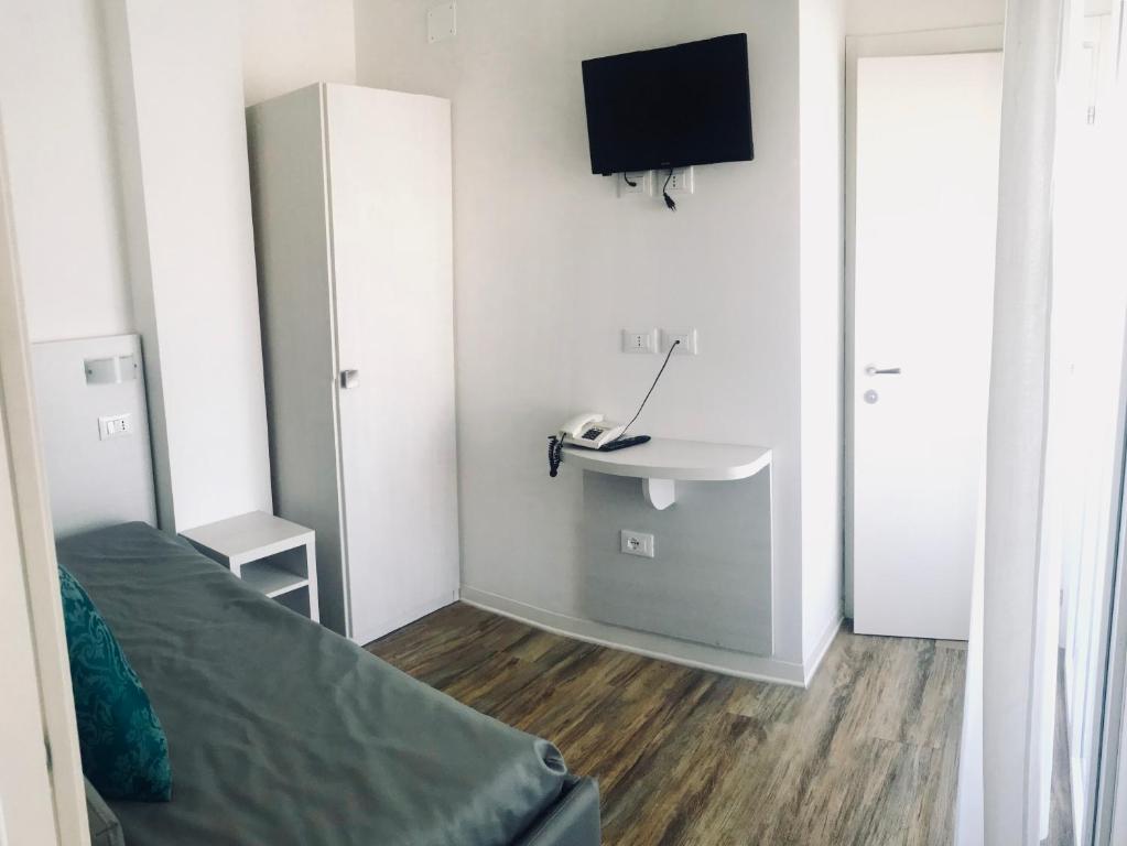 TV a/nebo společenská místnost v ubytování Hotel Nelson