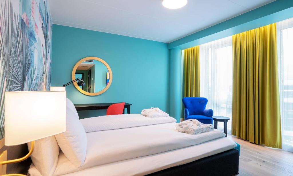 Postel nebo postele na pokoji v ubytování Thon Hotel Storo
