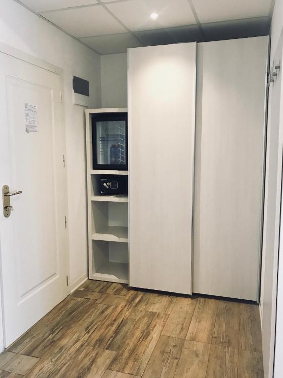 Kuchyň nebo kuchyňský kout v ubytování Hotel Nelson