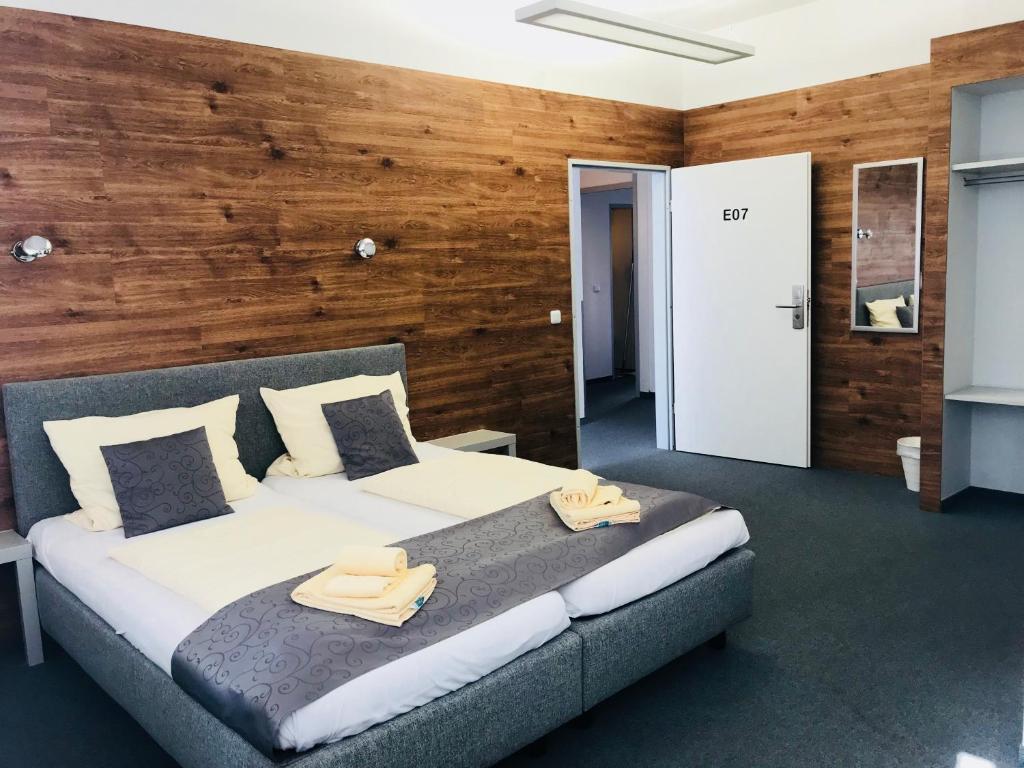 Postel nebo postele na pokoji v ubytování CREO Munich City
