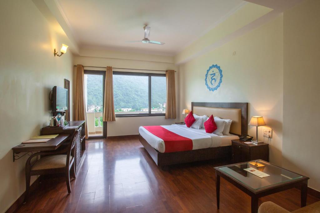 Postel nebo postele na pokoji v ubytování Hotel Dewa Retreat- A Himalayan Boutique Hotel