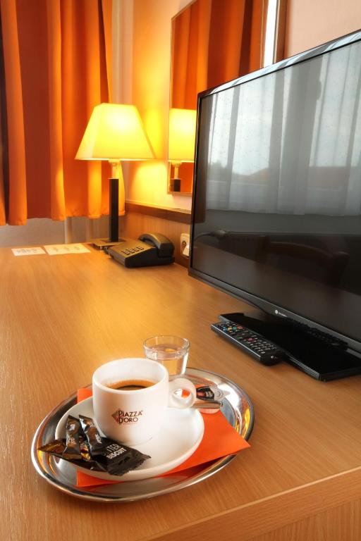 TV a/nebo společenská místnost v ubytování Hotel Strážnice