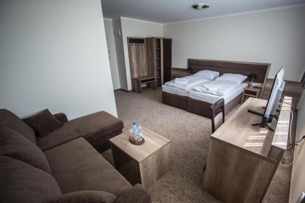 Postel nebo postele na pokoji v ubytování Hotel Cargo