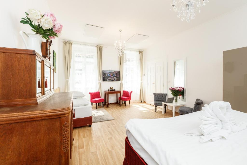 Postel nebo postele na pokoji v ubytování Prague Siesta Apartments