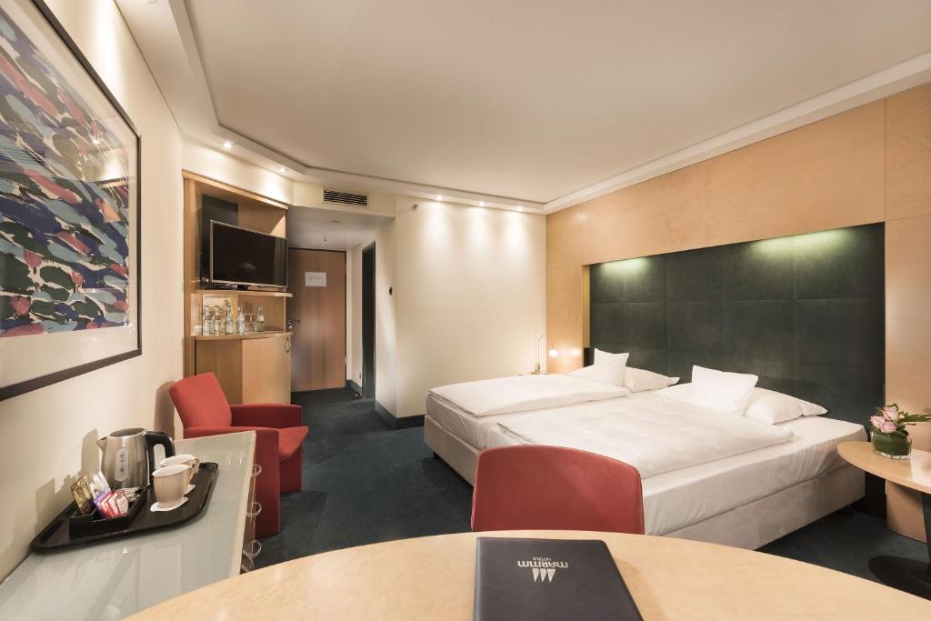 Телевизор и/или развлекательный центр в Maritim proArte Hotel Berlin