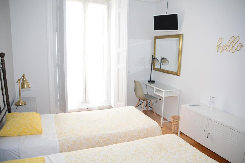 Postel nebo postele na pokoji v ubytování Alvaro Residencia