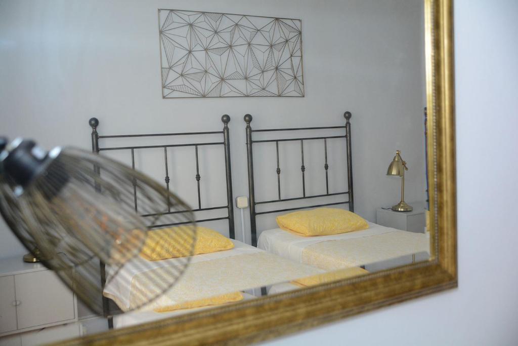 Postel nebo postele na pokoji v ubytování Alvaro Residencia