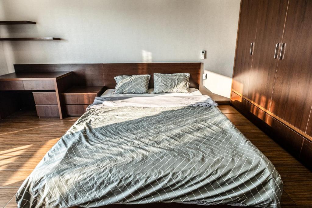 Postel nebo postele na pokoji v ubytování Homestay Villa Full House