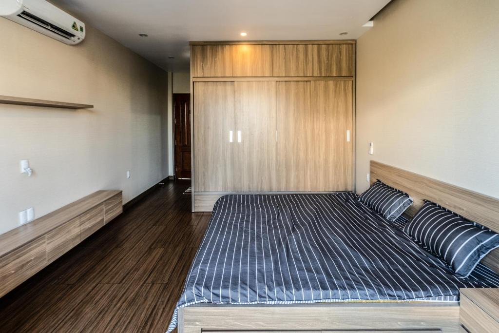 Postel nebo postele na pokoji v ubytování Homestay Villa Full House