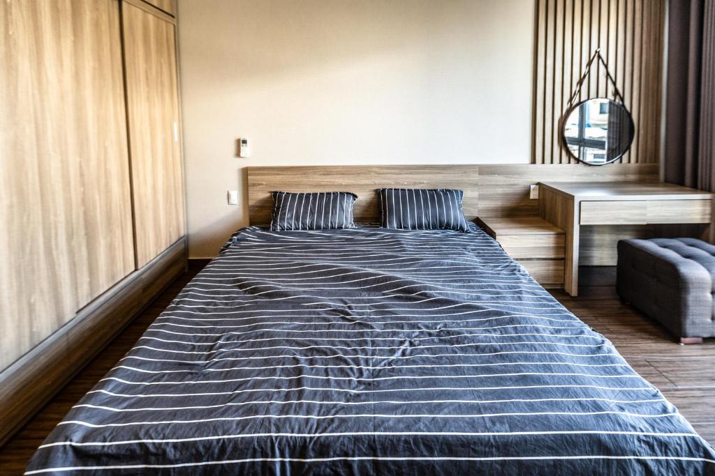 Postel nebo postele na pokoji v ubytování Homestay Villa Full House