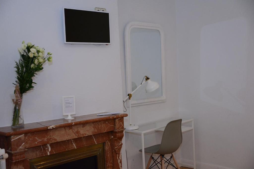 TV a/nebo společenská místnost v ubytování Alvaro Residencia