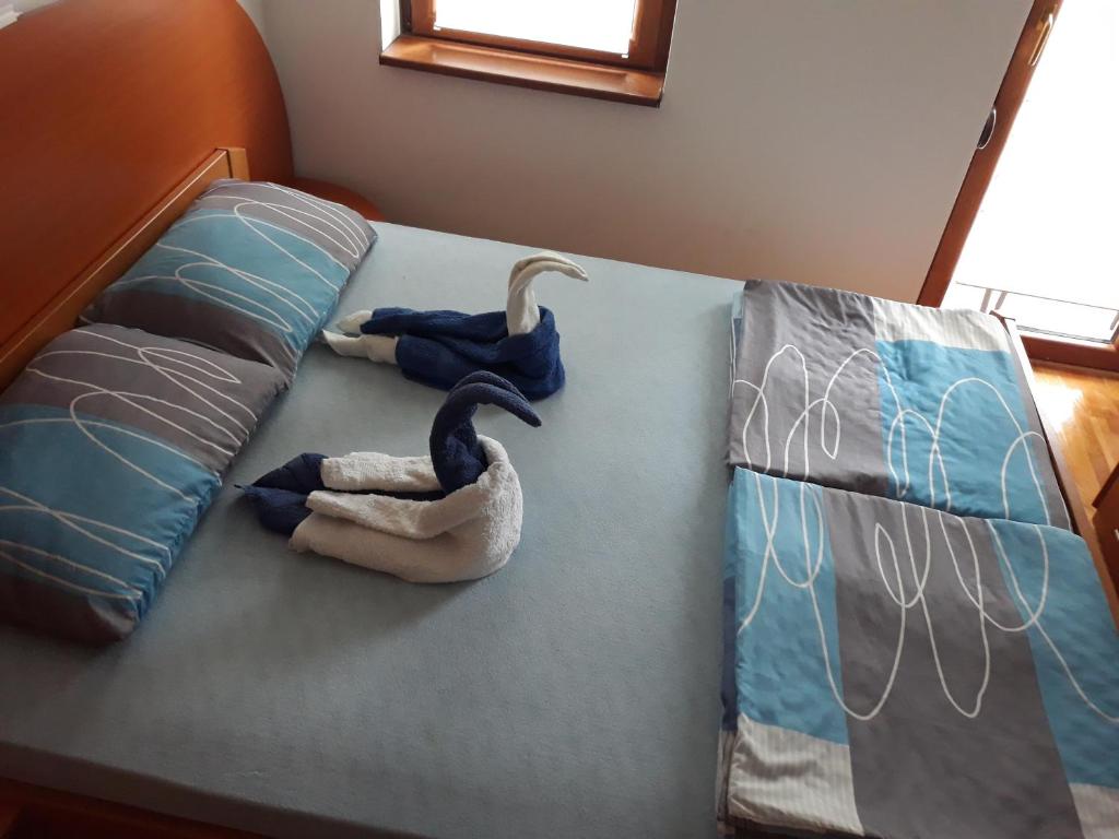 Un pat sau paturi într-o cameră la Apartment Hedonic