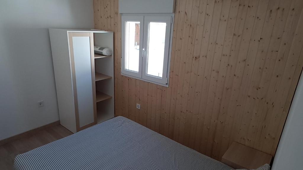 Postel nebo postele na pokoji v ubytování Acogedor apartamento en el barrio del Parlamento de Andalucía (Sevilla)