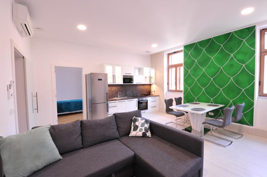 Kuchyň nebo kuchyňský kout v ubytování Argo Apartments