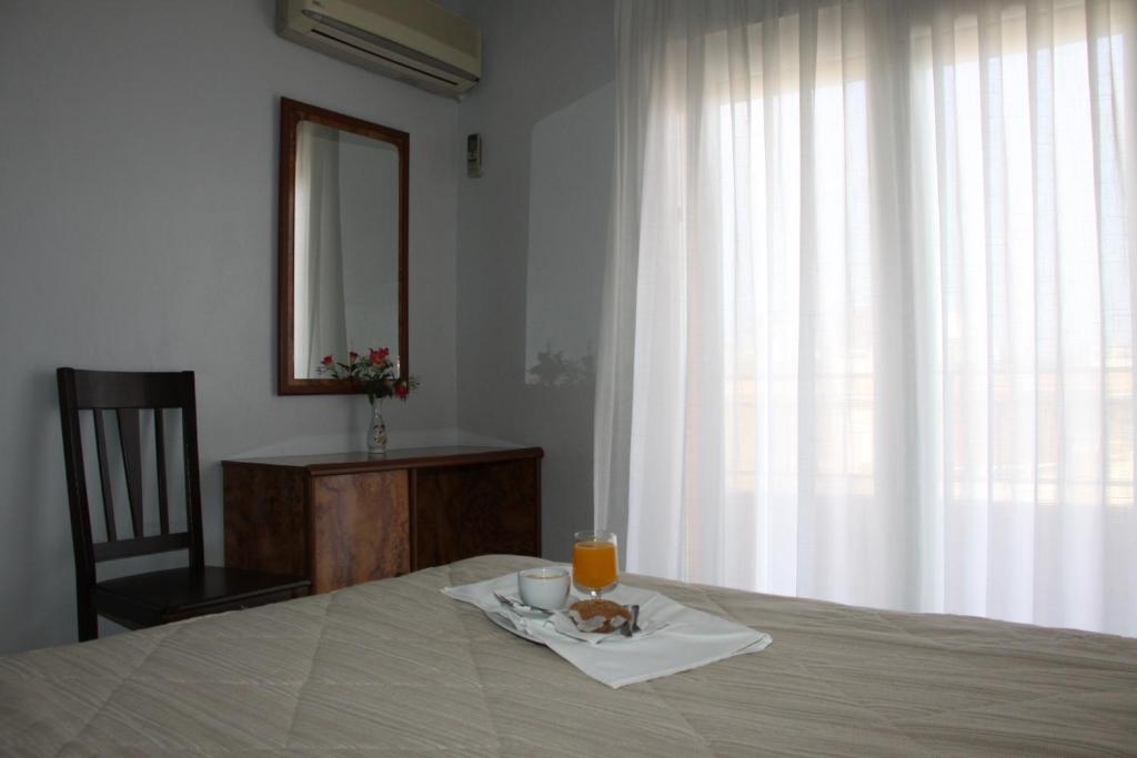 Postel nebo postele na pokoji v ubytování Hotel Trabuco