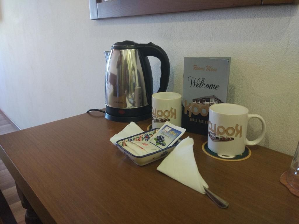 Příslušenství pro přípravu čaje a kávy v ubytování Hotel Kodra