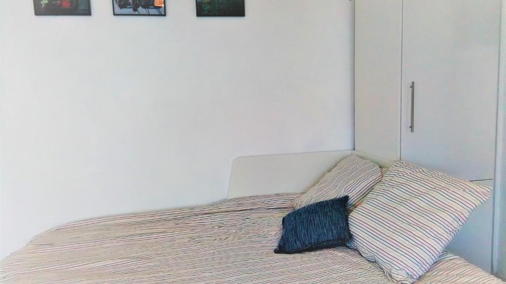 Postel nebo postele na pokoji v ubytování Grand Studio Vue Mer