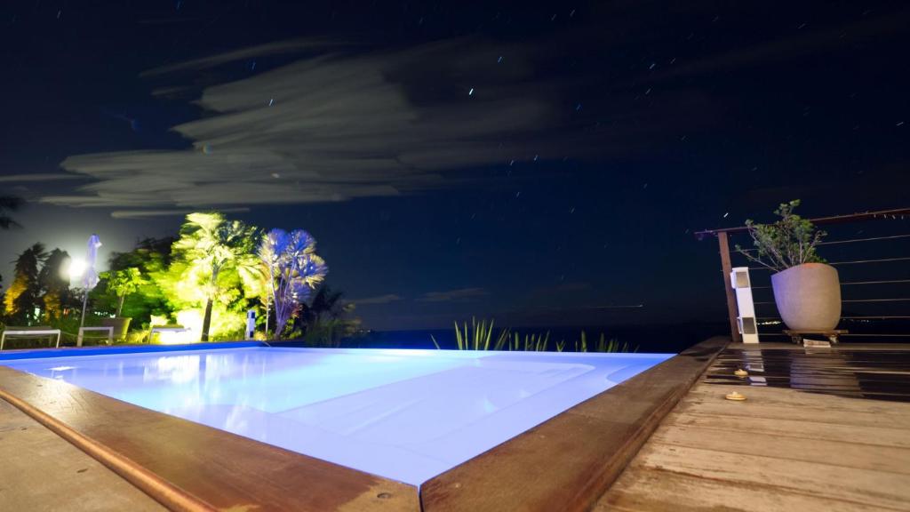 Bazén v ubytování Villa Cajou chambres d'hôtes chez l'habitant et Zanzibar cottage nebo v jeho okolí
