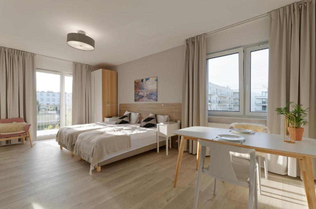 Posteľ alebo postele v izbe v ubytovaní Apple Green Apartments