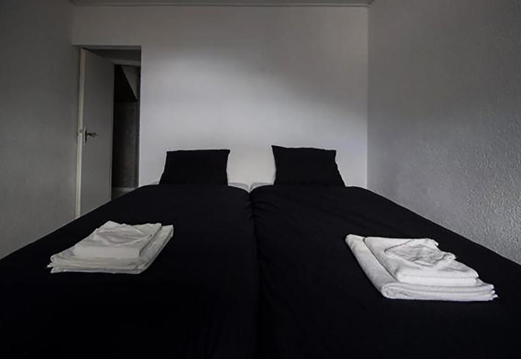 Postel nebo postele na pokoji v ubytování DF am Ring Nürburg