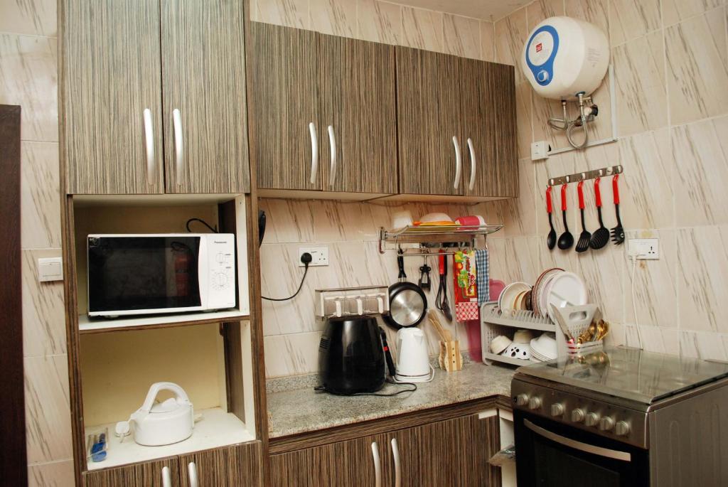 Kuchyň nebo kuchyňský kout v ubytování Health Plaza Abuja