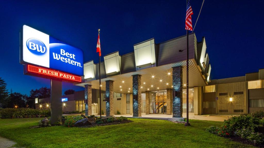a building with a best western sign in front of it at Best Western North Bay Hotel & Conference Centre in North Bay