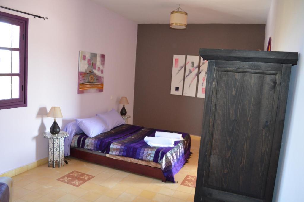 Postel nebo postele na pokoji v ubytování Casa Naima