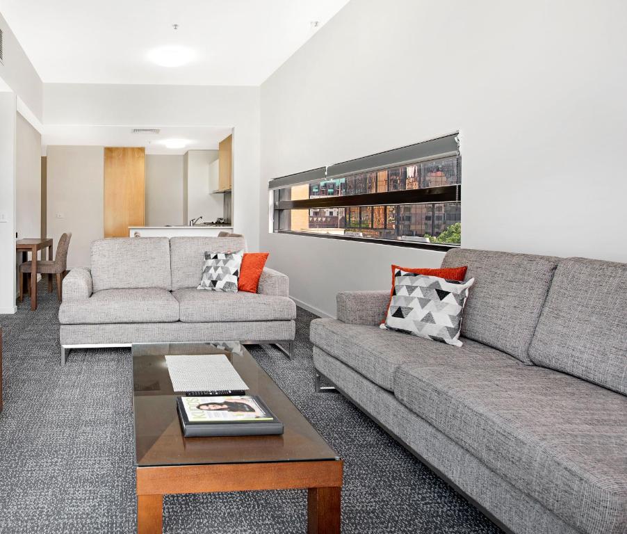 Posezení v ubytování Melbourne CBD Central Apartment Hotel Official