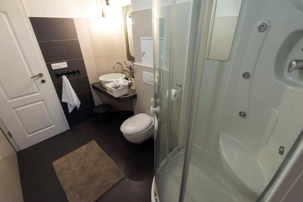 Kúpeľňa v ubytovaní Apartment Lita Center