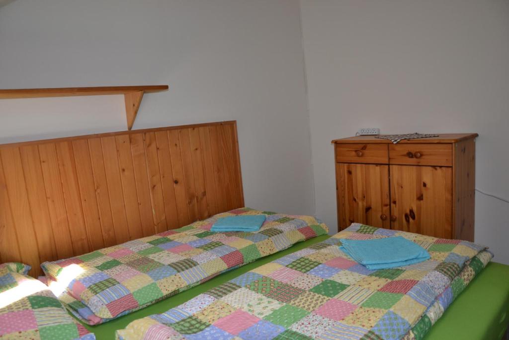 Postel nebo postele na pokoji v ubytování Penzion U Lípy