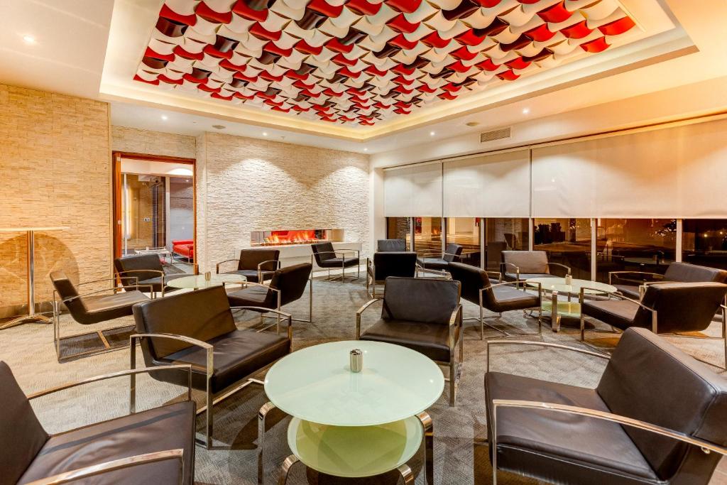 Posezení v ubytování Mantra Charles Hotel