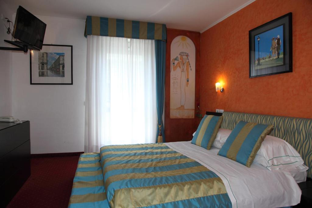 Postel nebo postele na pokoji v ubytování Hotel Soraya