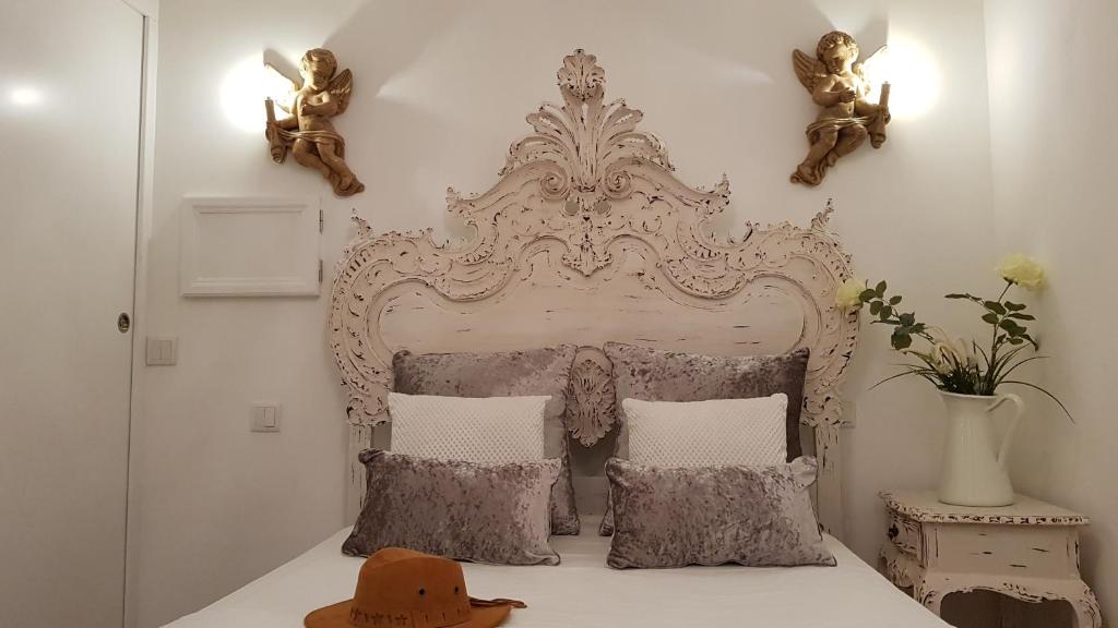 Ένα ή περισσότερα κρεβάτια σε δωμάτιο στο Charming Apartment II Historical Center