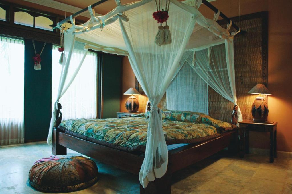Postel nebo postele na pokoji v ubytování Medana Resort Lombok