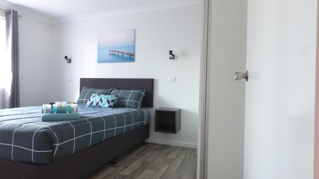 Ein Bett oder Betten in einem Zimmer der Unterkunft Esperance Bay Holiday Park