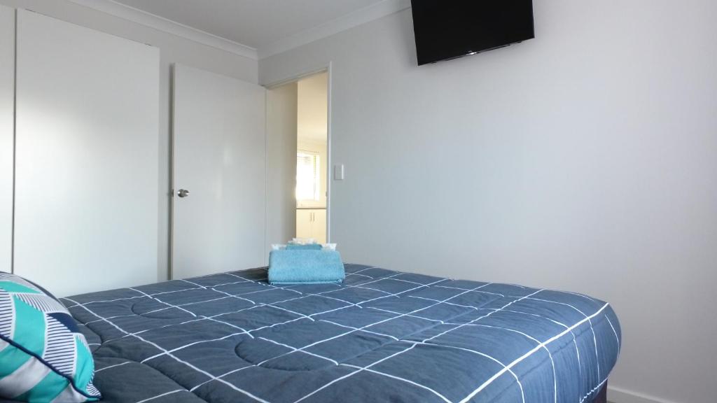Ein Bett oder Betten in einem Zimmer der Unterkunft Esperance Bay Holiday Park