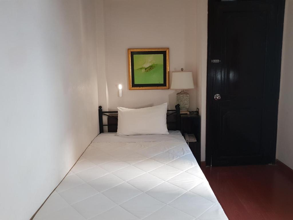 Postel nebo postele na pokoji v ubytování Memory Hotel