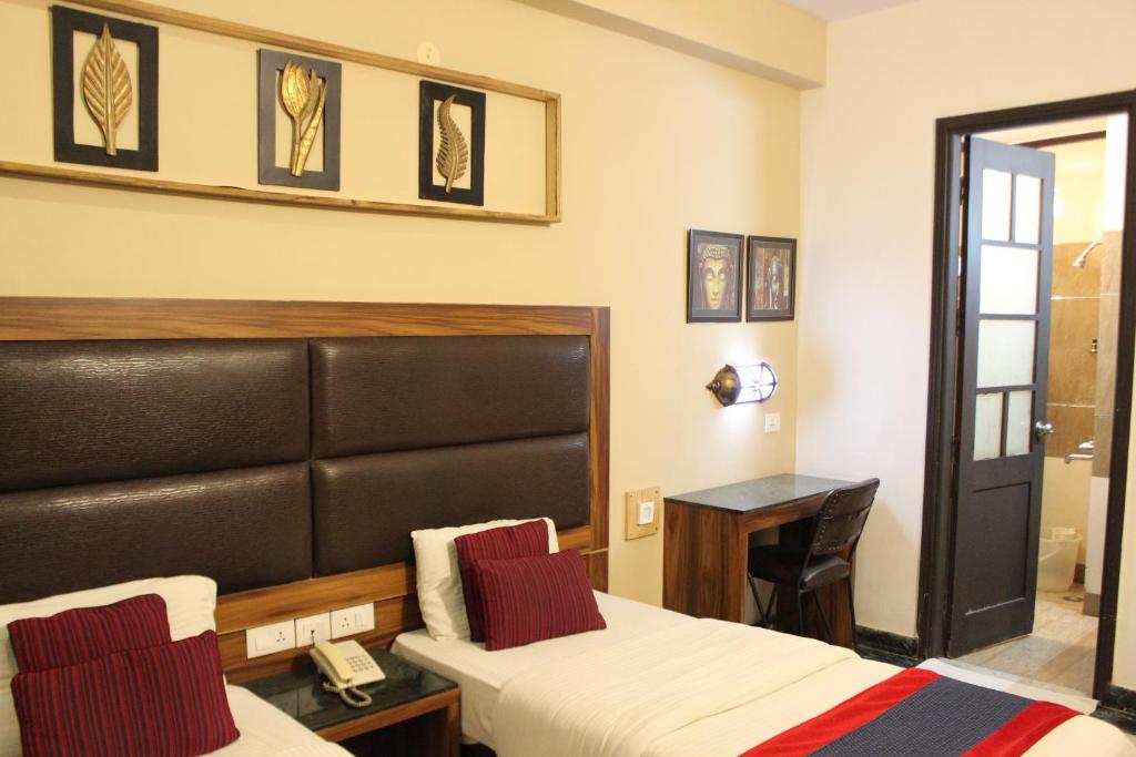 Posteľ alebo postele v izbe v ubytovaní Hotel Imperial Park