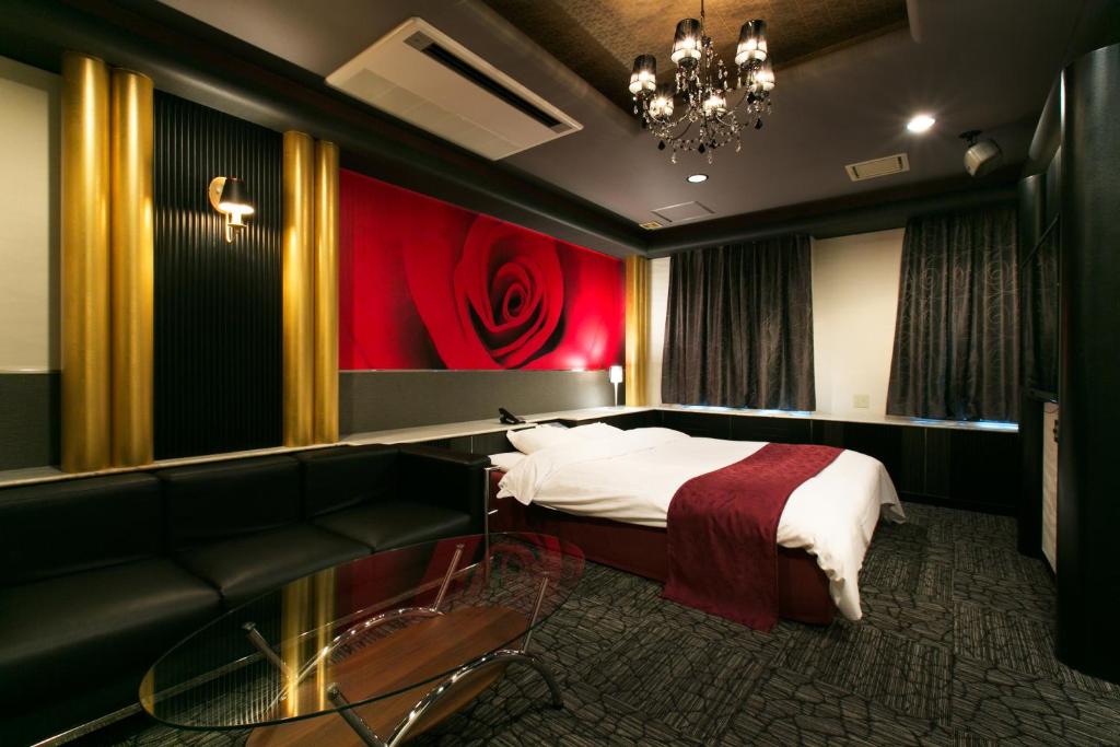 Postel nebo postele na pokoji v ubytování Hotel Atlantis Otsu (Adult Only)