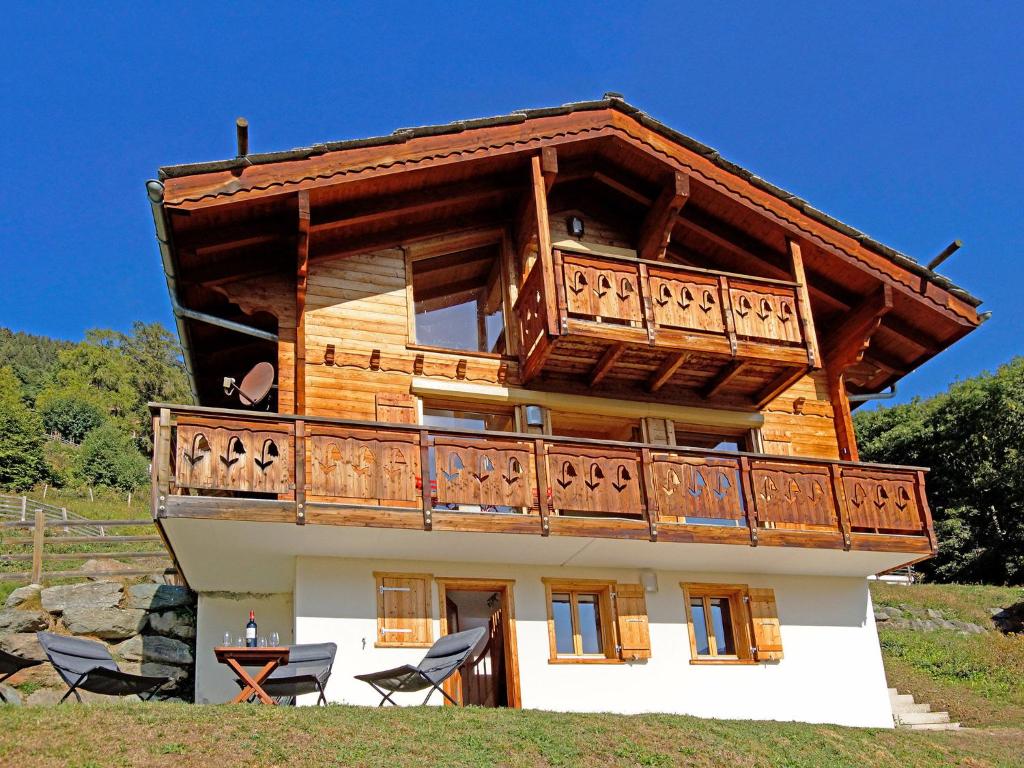 a house with a balcony on top of it at Fabulous Holiday Home in Les Collons in Ski Area in Les Collons