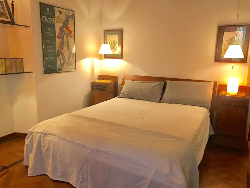 Posteľ alebo postele v izbe v ubytovaní Lovelyloft - Alzaia Naviglio